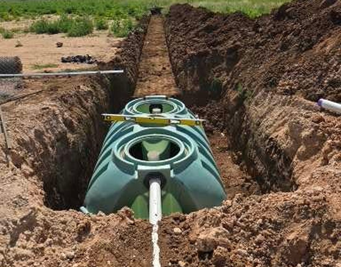 New septic tank installed in an open trench